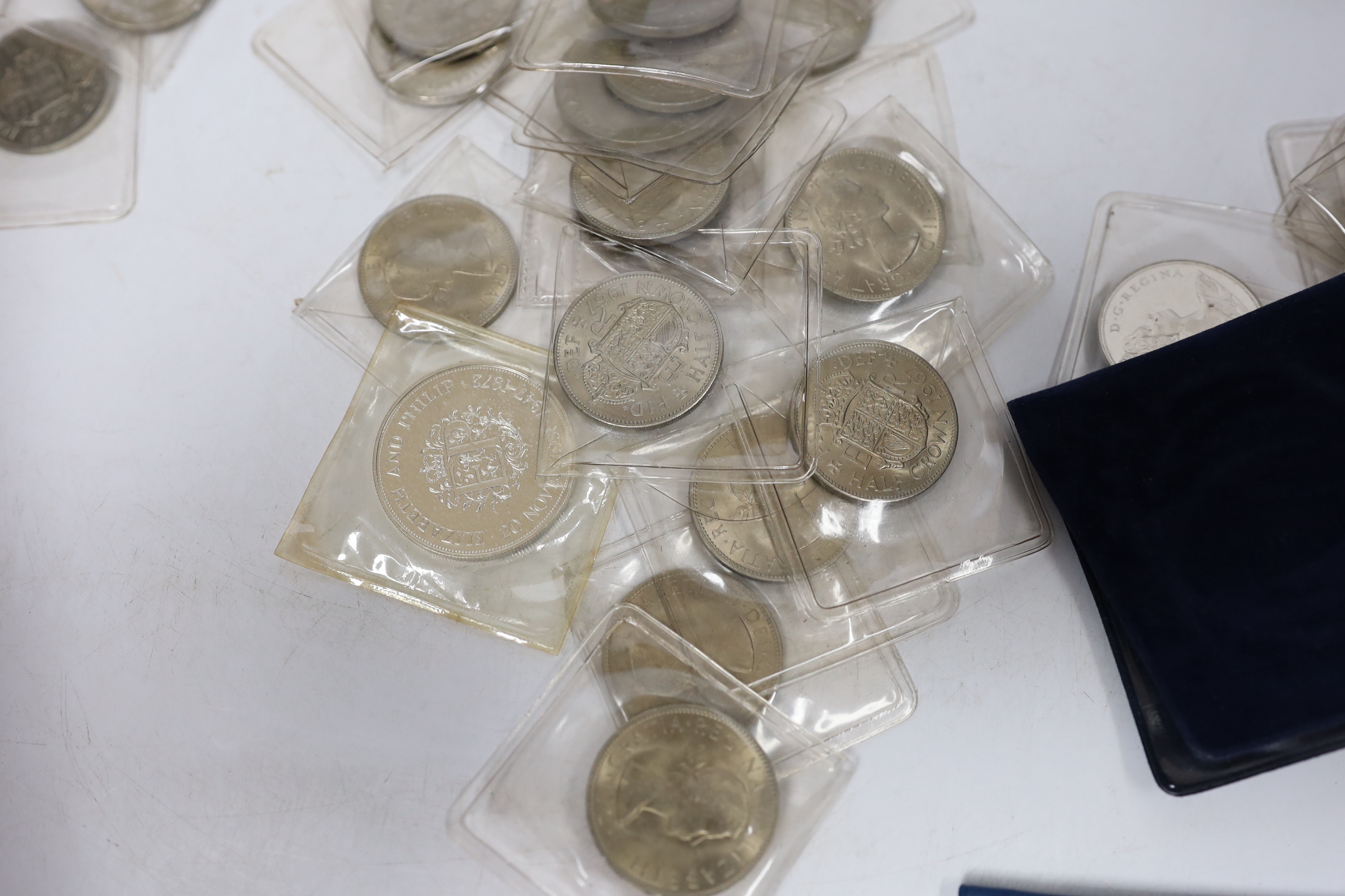 A group of assorted coins including half crowns, five shillings etc
